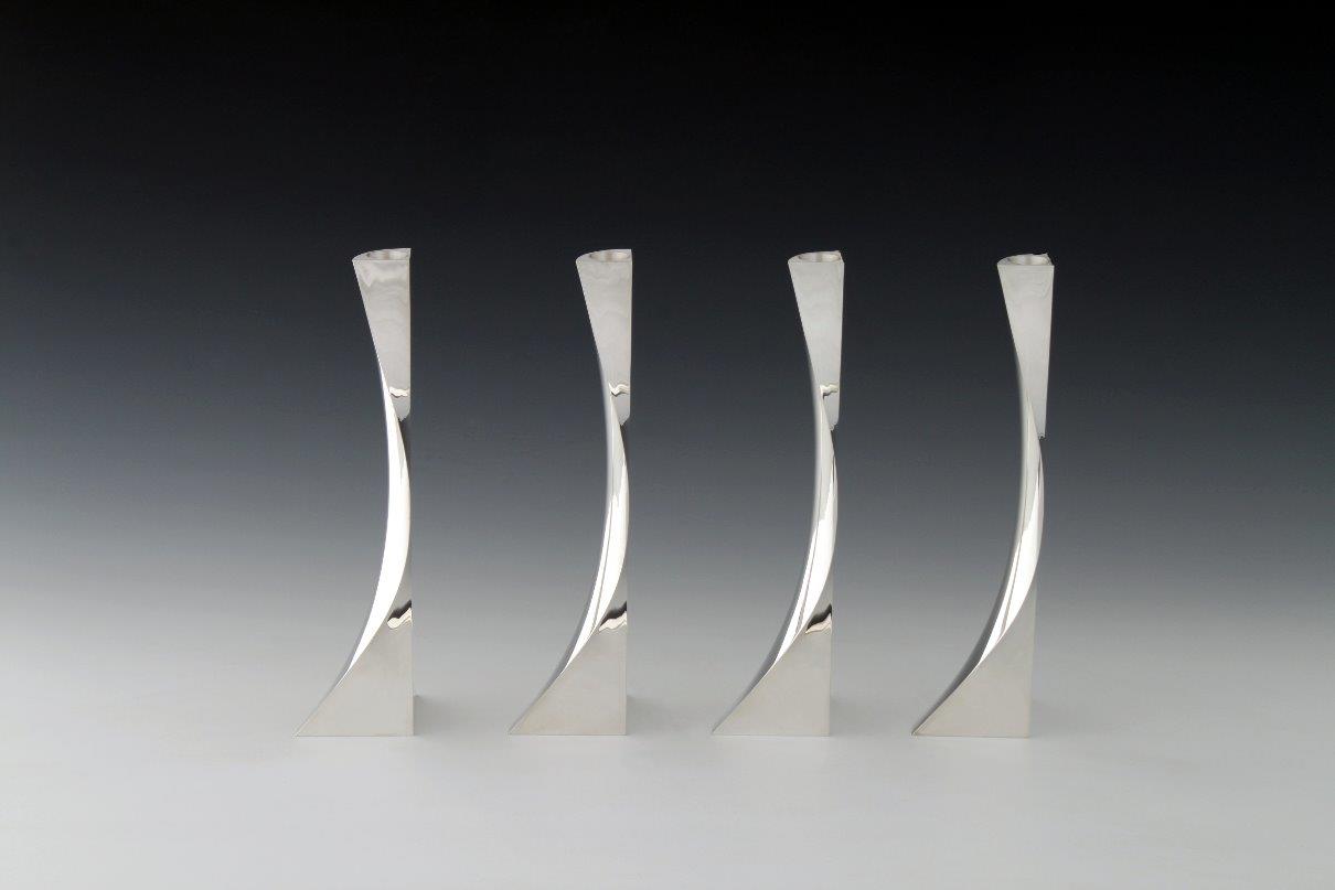 Silver candlesticks Fourfold round, designed and executed by silversmith Wouter van Baalen, Amsterdam 2009