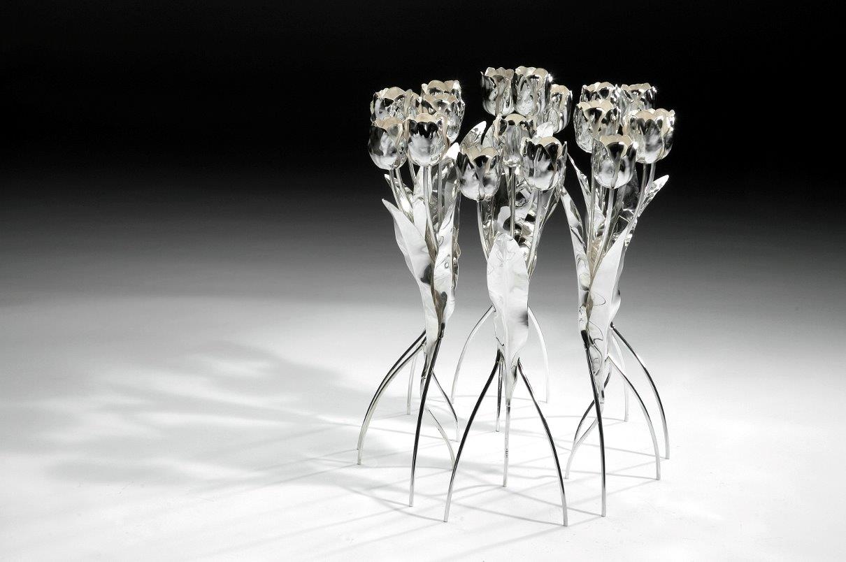 Six candle holders DANCING TULIPS. Designed and executed by Dutch silversmith Wouter van Baalen. Gift from the Government of the Kingdom of the Netherlands to Her Majesty Queen Beatrix on the occasion of her Silver Jubilee as Head of State in 2005. Designed and executed by silversmith Wouter van Baalen. Schoonhoven 2005