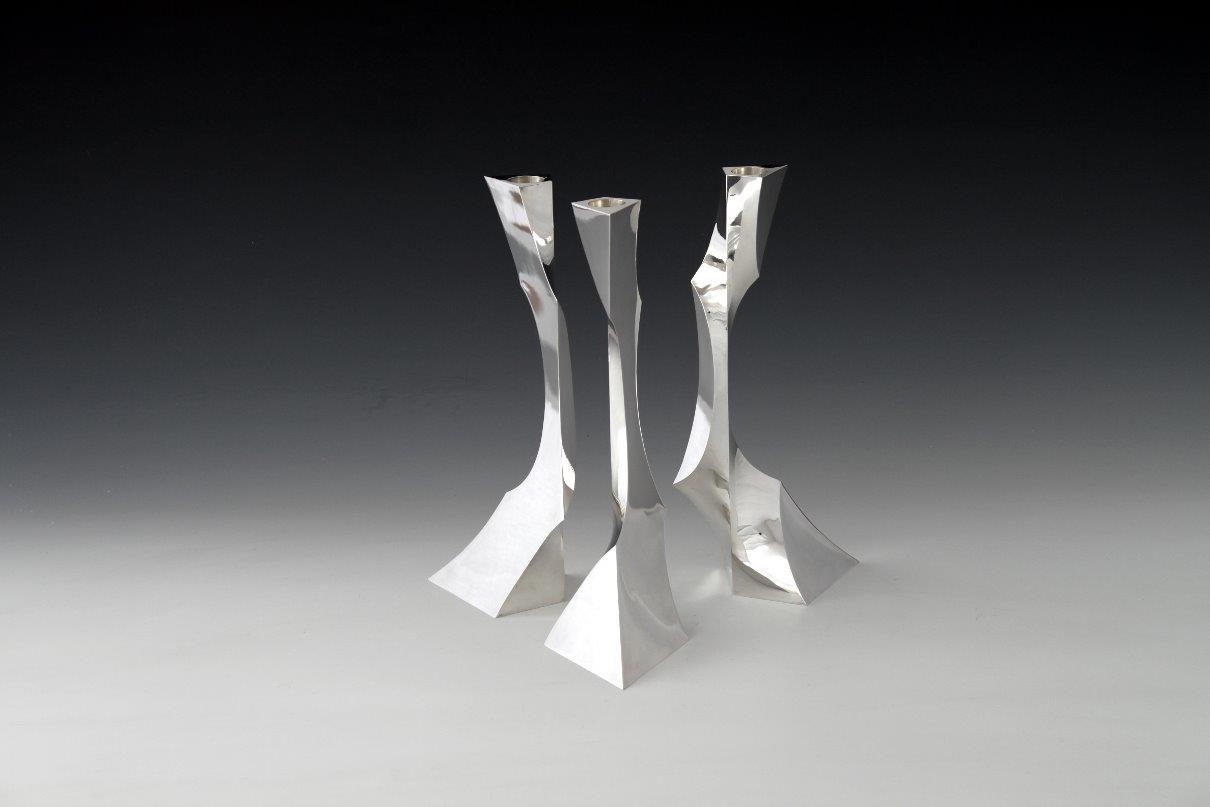 Sterling silver candlesticks Threefold triangle, designed and executed by silversmith Wouter van Baalen, Amsterdam 2010