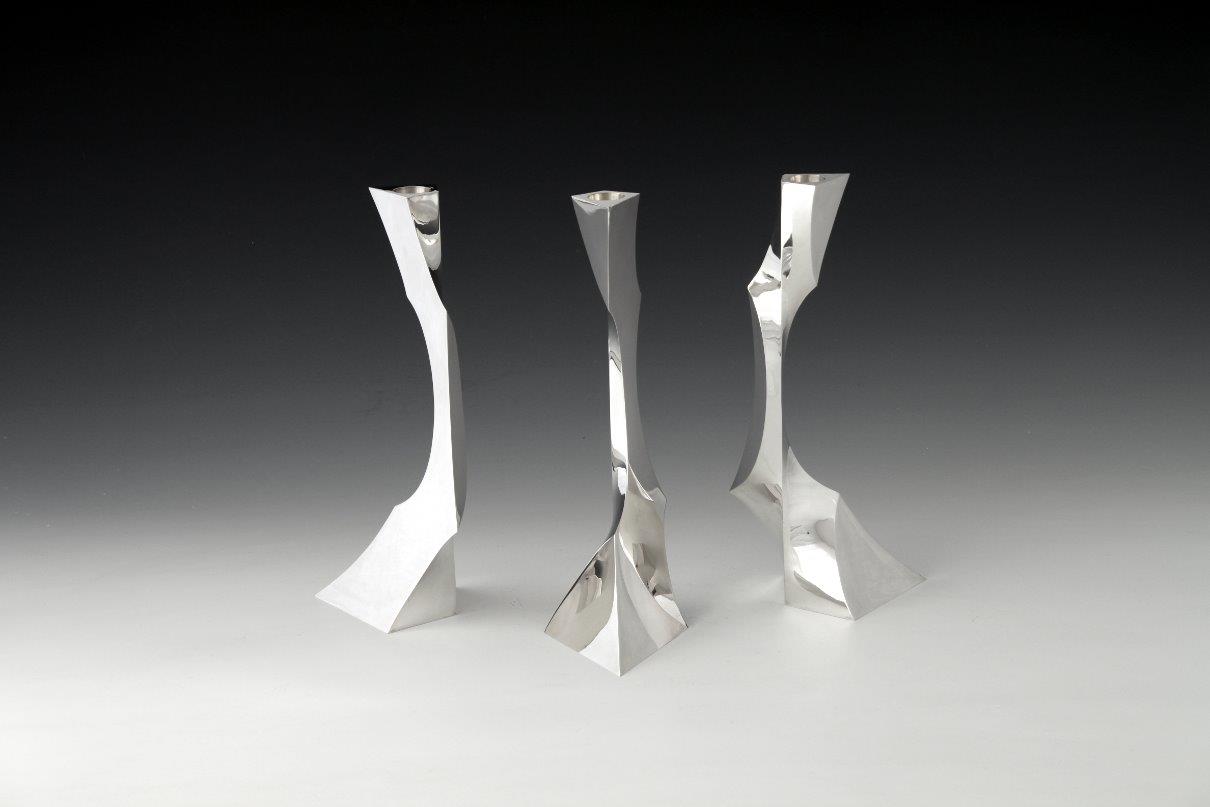 Sterling silver candlesticks Threefold triangle, designed and executed by silversmith Wouter van Baalen, Amsterdam 2010